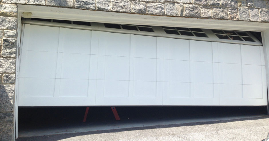 Broken garage door repairs Sumner